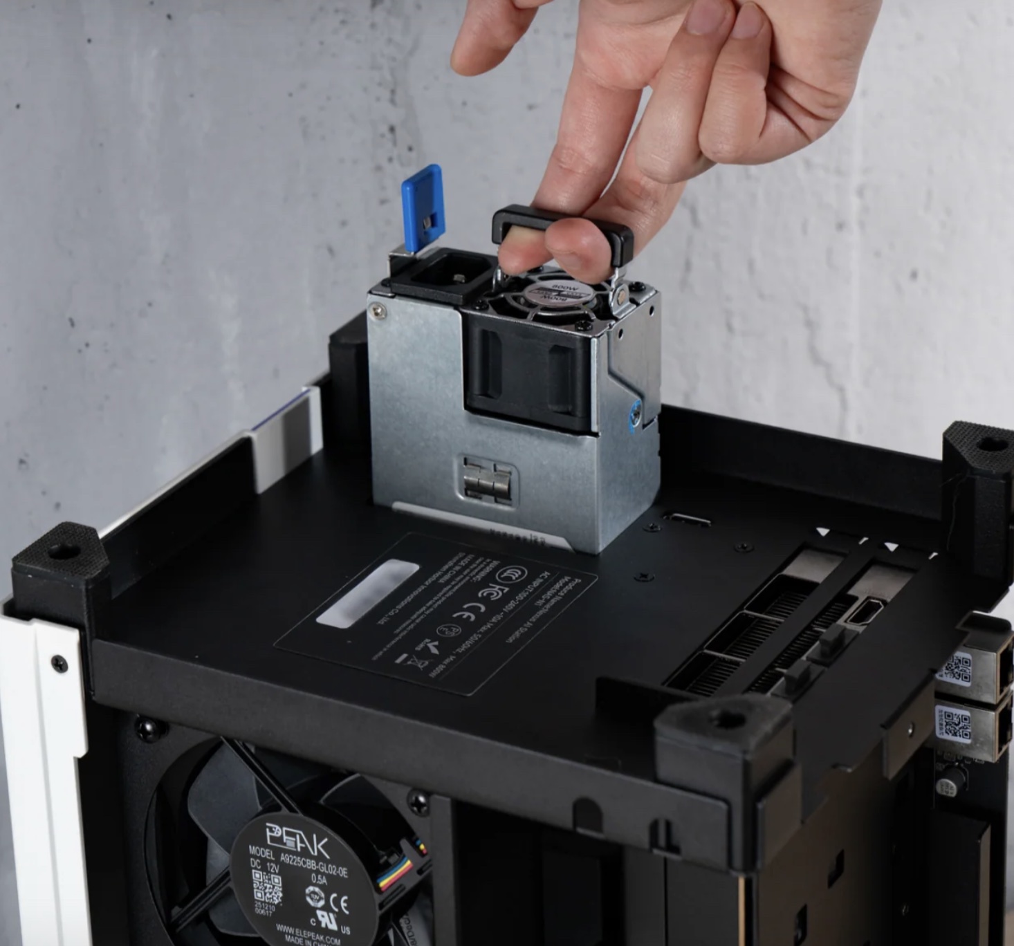Nexus internal power supply being removed by its handle
