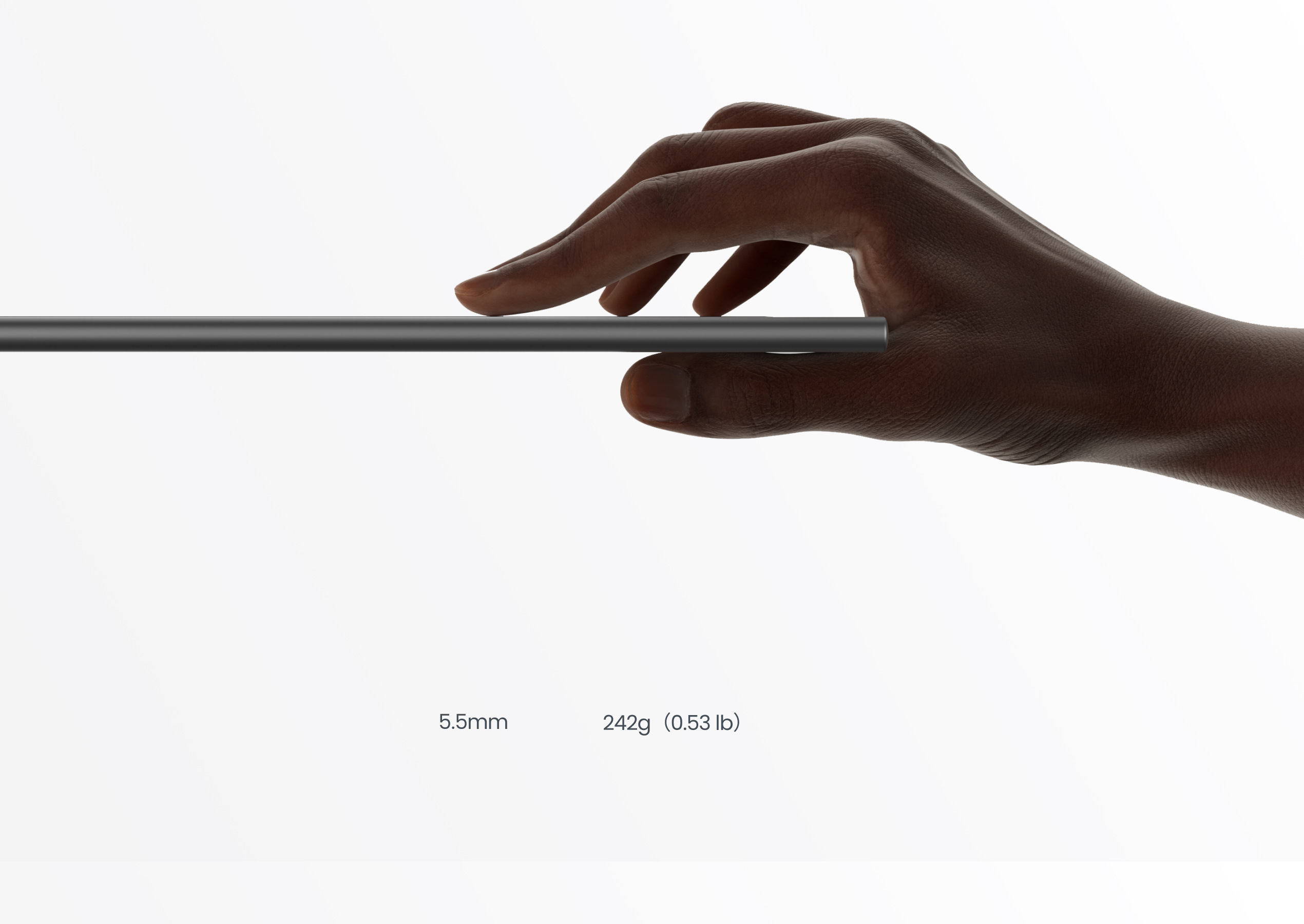 The slim Paper7 profile held in one hand